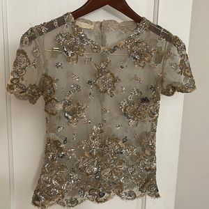 Valentino SpA sheer nude floral embellished fitted top